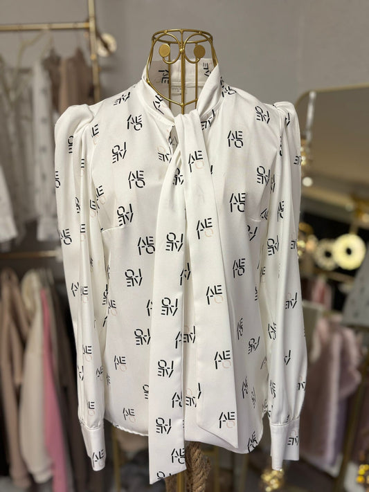 Elegante Bluse mit Schluppe & Allover-Print